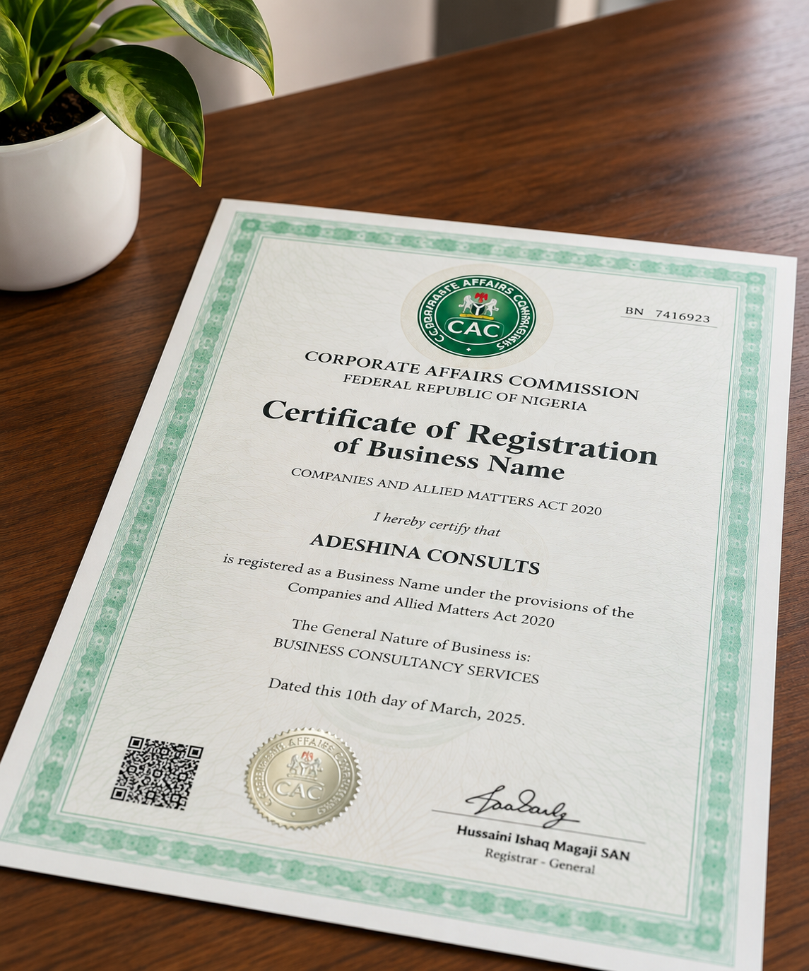 CAC business name registration certificate on a desk